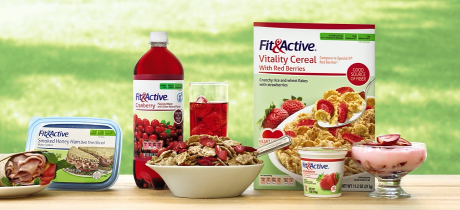 Various Fit &amp; Active Products on picnic table in grass.