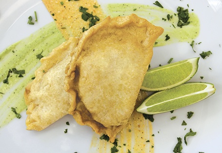 Corn and Pepper Empanada with Avocado and Red Pepper Cream